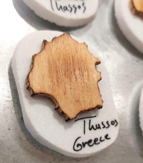 Thassos white marble and wooden map as souvenir magnet