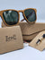 Emperor in curry wooden sunglasses