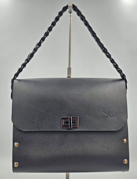 Black vachetta leather top handle bag with olive treee wood