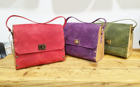 Red oil leather top handle bag and olive treee wood