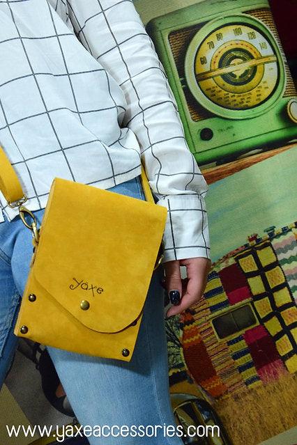 Yellow belt bag from leather and wood